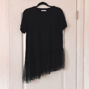 Black asymmetrical shirt with mesh ruffled bottom
